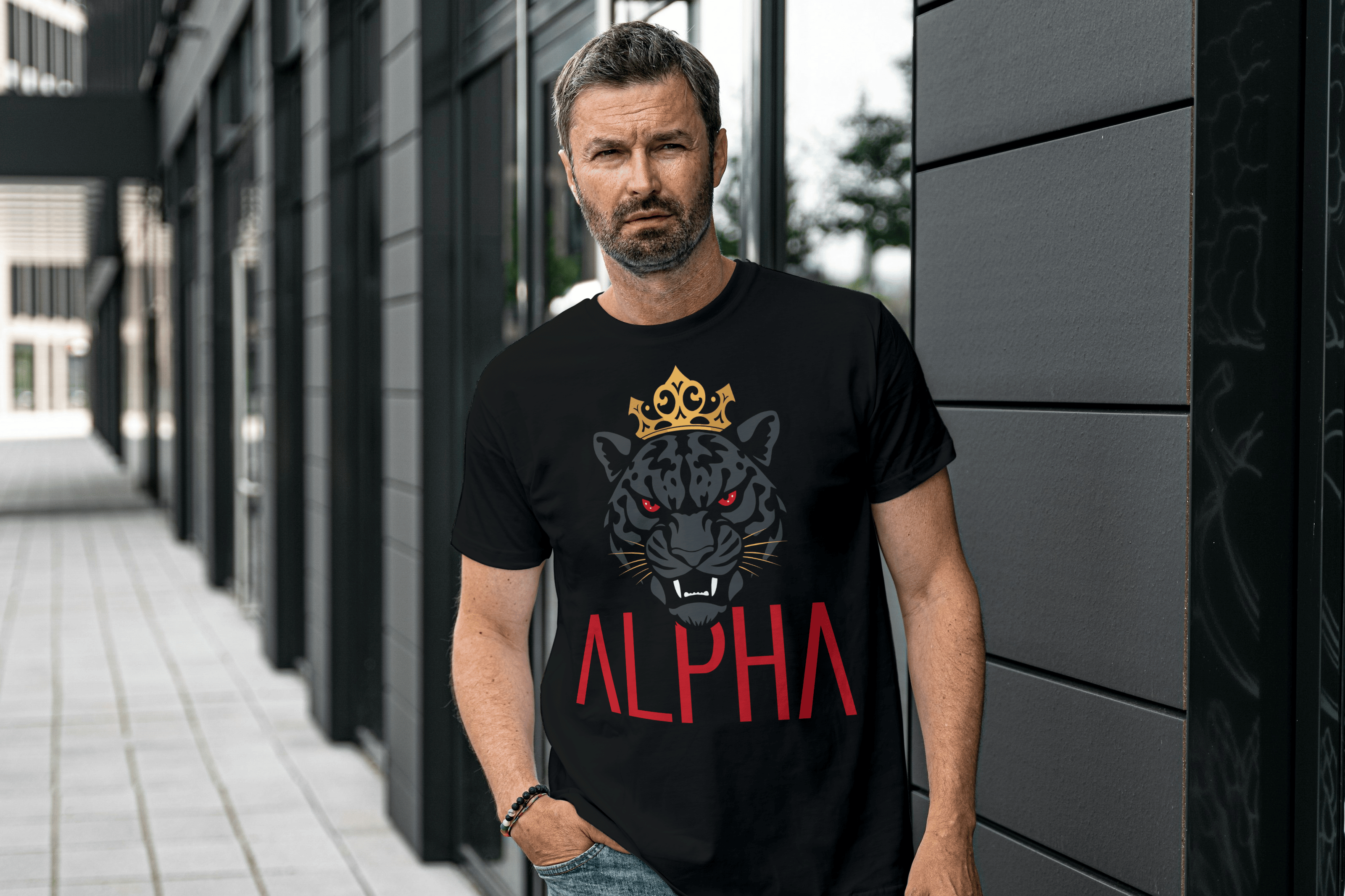 Athletic male wearing black Alpha shirt with jaguar face and bold red font.